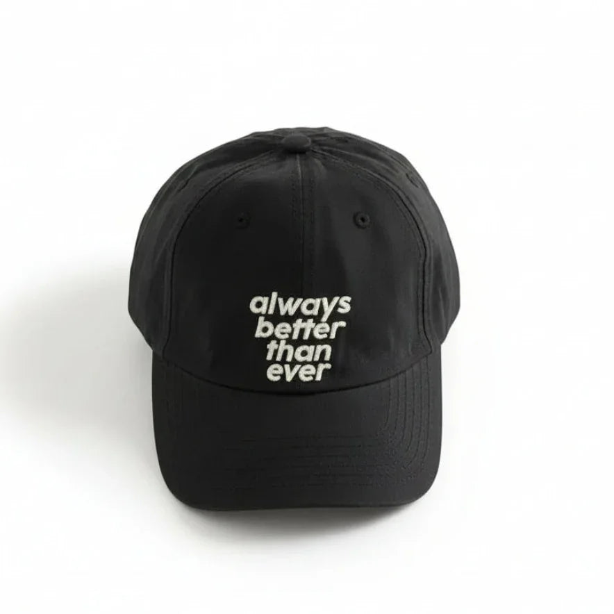 Black dad hat with 'always better than ever' embroidery, minimalist streetwear style