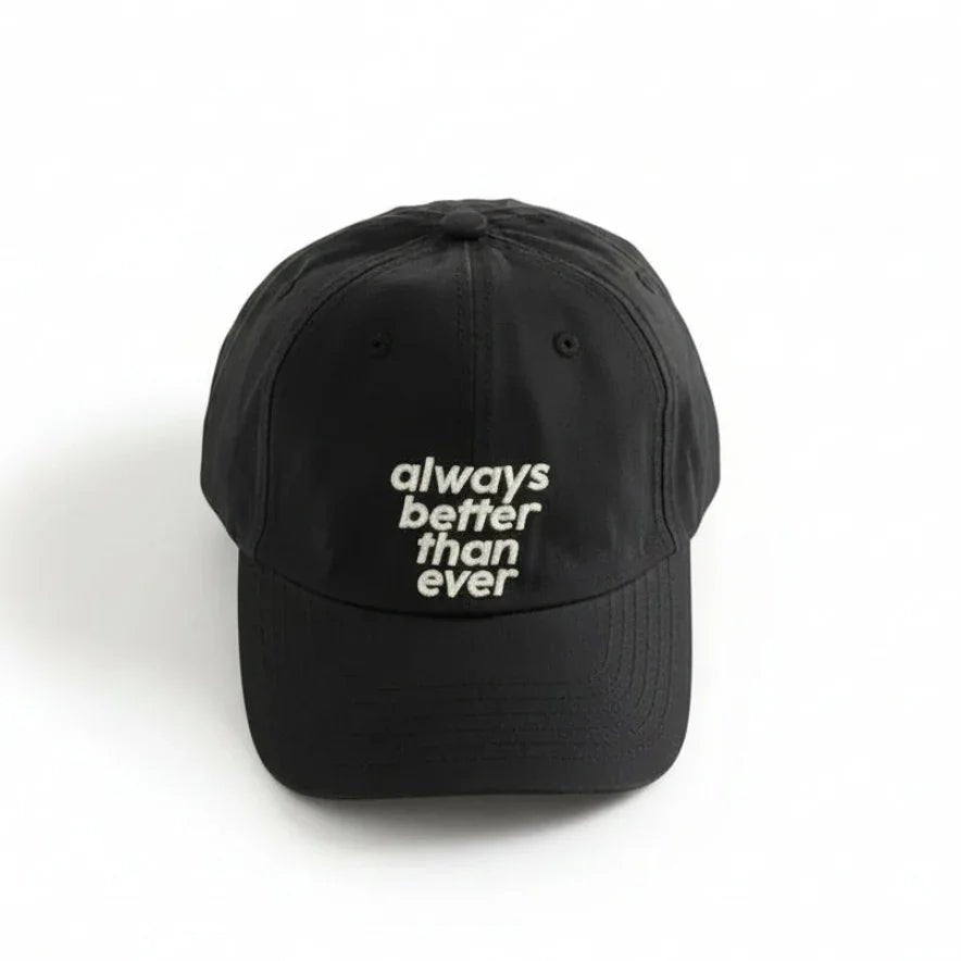 Black dad hat with 'always better than ever' embroidery, minimalist streetwear style